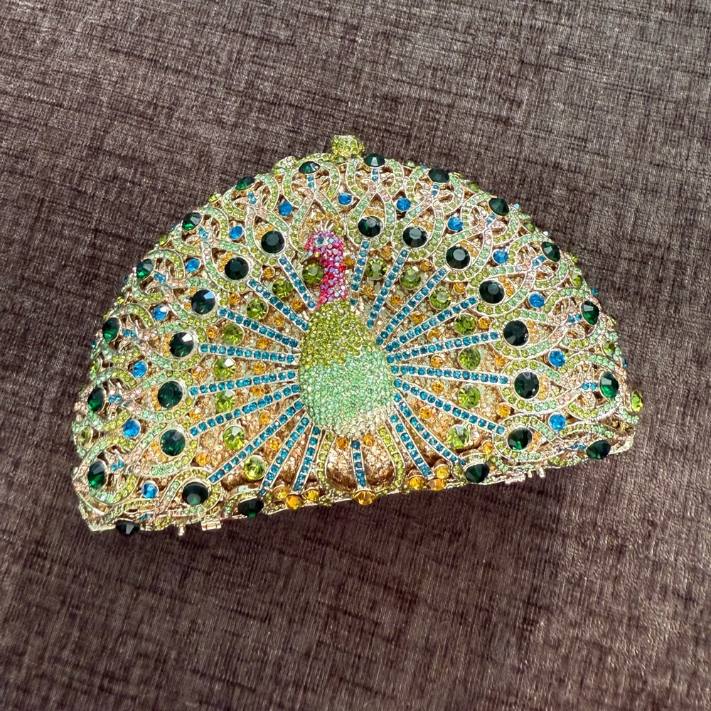 Luxory peacock clutch bag
